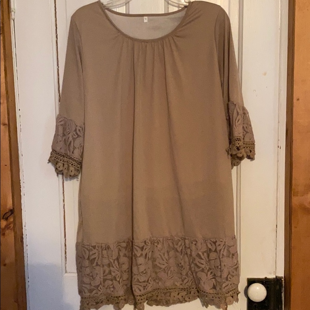 Taupe colored short sleeve laced long shirt.